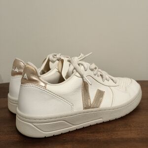 Veja Women's White and Gold Sneakers